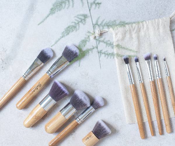 A table with some brushes and a bag